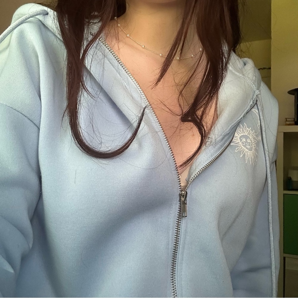 light blue oversized zip up
